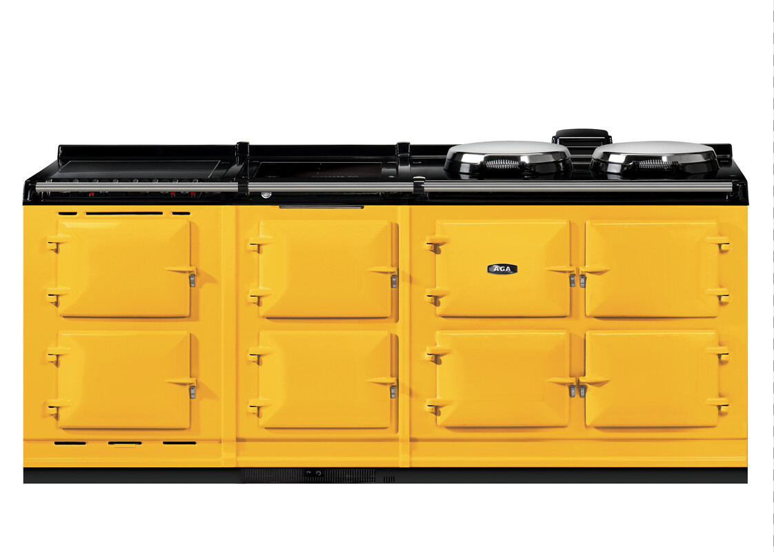 Großer gelber AGA-Herd mit sechs Backofentüren und zwei runden Kochplatten, ideal für die moderne Küche