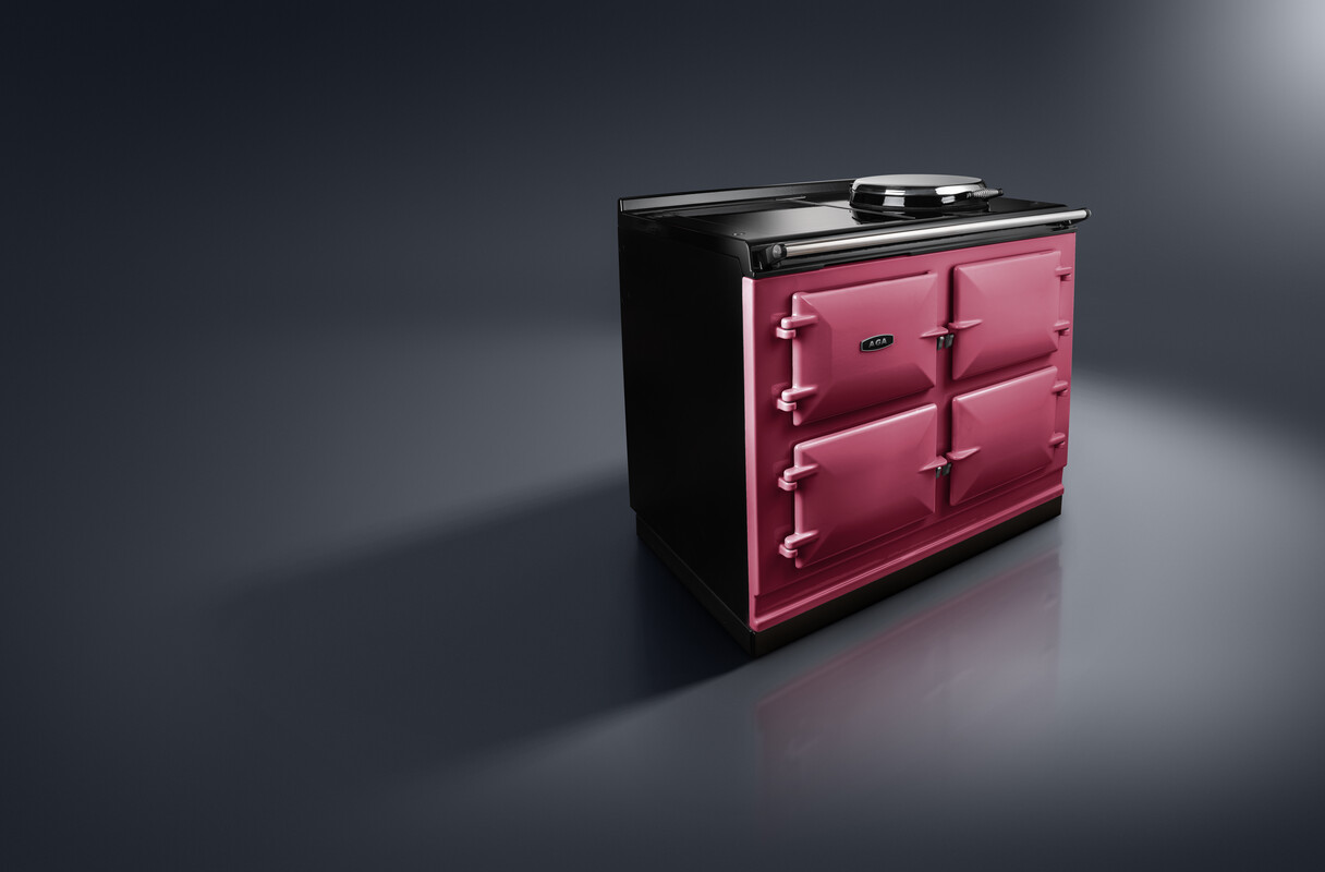 Pinkfarbener AGA Standherd mit vier Türen und glänzender Oberfläche im modernen Stil