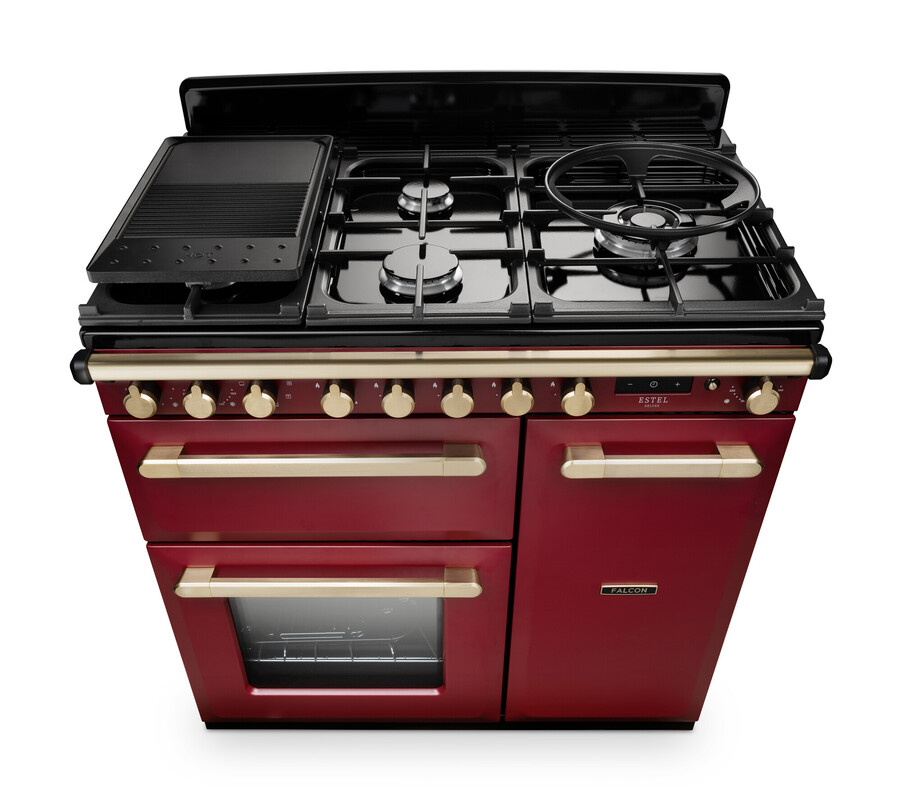 Roter Falcon Standherd mit Gas-Kochfeld, mehreren Drehknöpfen und zwei Backofentüren, Grillplatte und Glastür